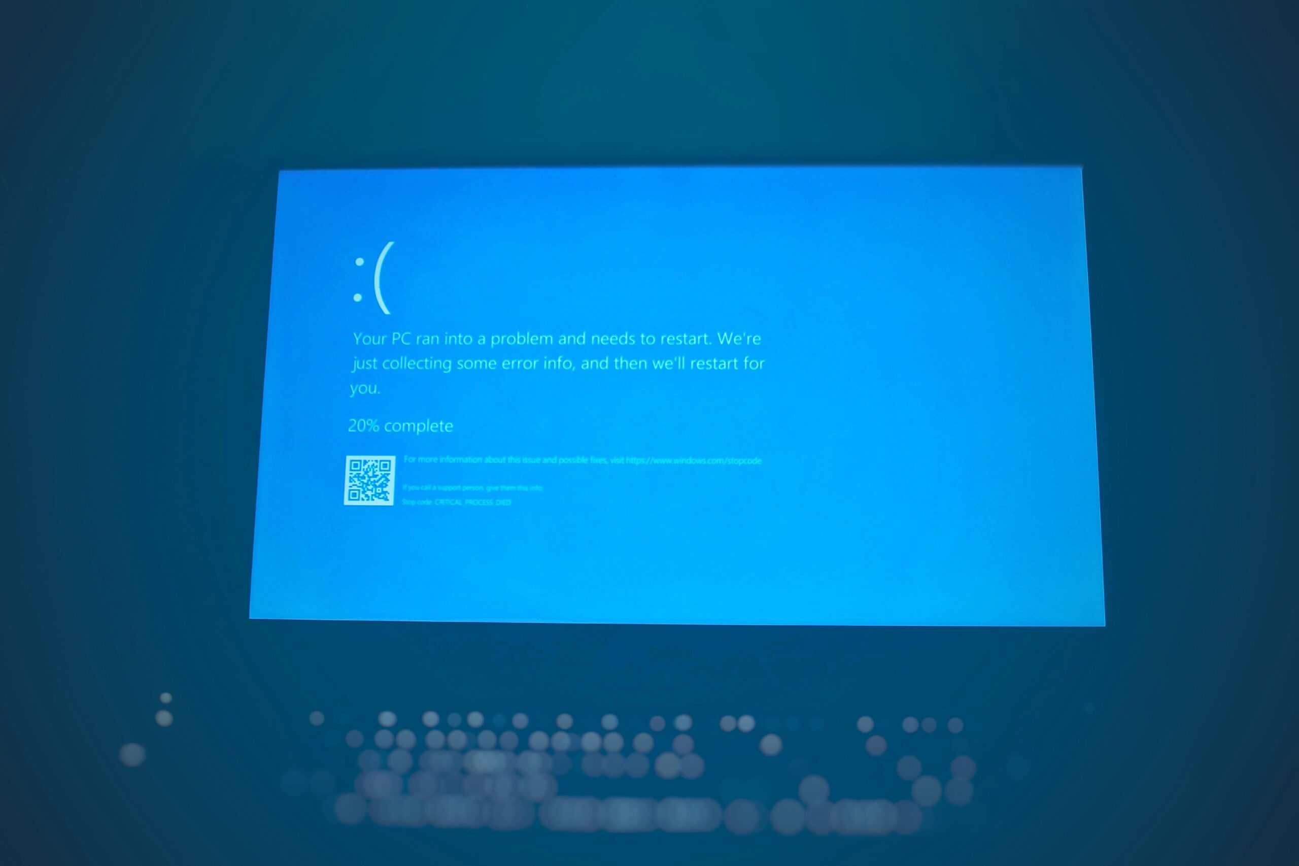 A laptop displaying geolocation error messages