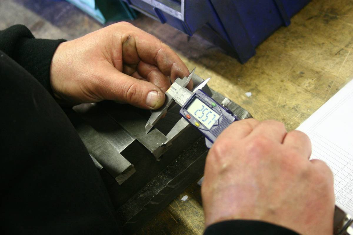 Close-up of hands installing a kill switch